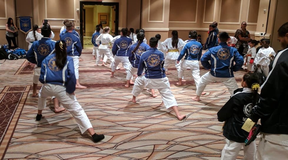karate team stretching at the tournament